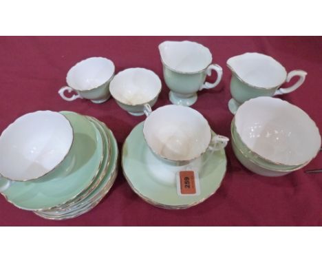 A Crown Staffordshire part tea service of 25 pieces