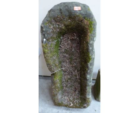 A stone garden trough. 37' long
