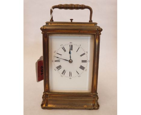 A French brass carriage clock, with lever platform escapement and quarter repeat movement striking on a coiled gong. 5½' high