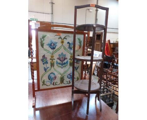 A folding three tier cakestand and a tapestry firescreen