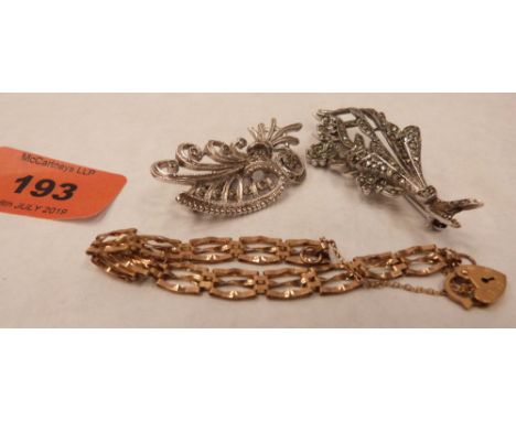 A 9ct gate link bracelet with locket clasp 3.8g and two marcasite brooches