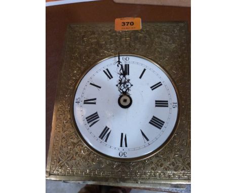 A fine brass clock movement, the twin fusee movement with verge escapement striking on two bells (one lacking). The foliate e