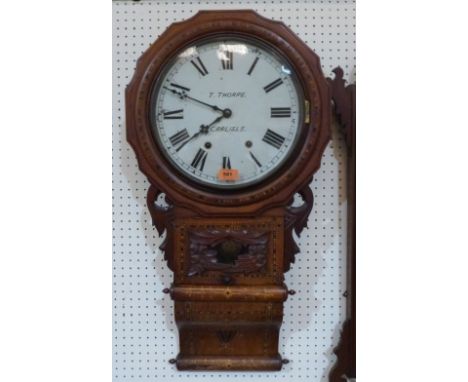 A 19th century American walnut marquetry drop-dial wall clock with two train movement. 32' high