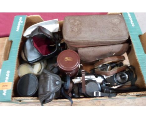 A collection of camera equipment to Carl Zeiss lens, various camera, light meter etc.