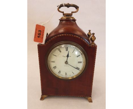 An Edward VII mahogany and inlaid mantle clock by Mappin &amp; Webb with French drum movement and pagoda case. 9' high