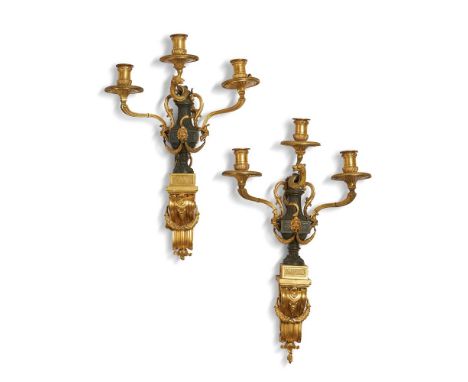 A PAIR OF FRENCH ORMOLU THREE LIGHT WALL SCONCES POSSIBLY BY ÉMMANUEL ZWIENER, CIRCA 1860 Central sconce on opposing griffin 