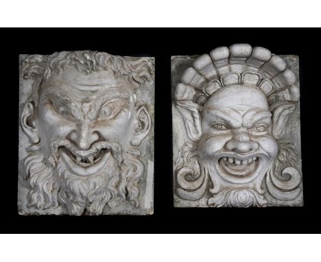 A PAIR OF PLASTER MASK PANELS POSSIBLY ITALIAN, EARLY 20TH CENTURY In the form of architectural mascarons each 65 x 56cmProve
