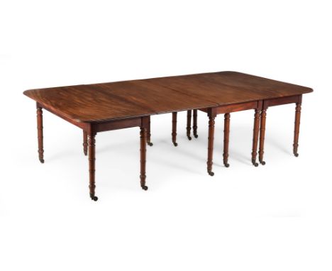 A REGENCY MAHOGANY DINING TABLECIRCA 1815In three sections, with one drop leaf72.5cm high, 262cm long when fully extended, 13