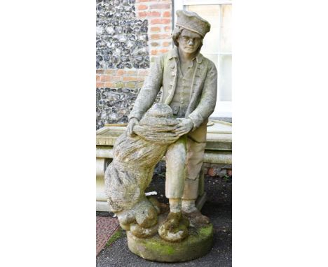 AN INTERESTING SCOTTISH CARVED STONE FIGURE OF A YOUNG BOY EARLY 19TH CENTURY Depicted wearing a short hat, cloak, clogs and 