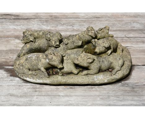 A COMPOSITION STONE GROUP OF PIGLETS PROBABLY 1920S61cm wide, 36cm deepCondition Report: Item with the expected weathering, l