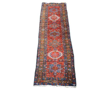 A HERIZ RUNNERapproximately 331 x 87cmCondition Report: Some wear to runner overall. Longest edges have been re-bound in vary
