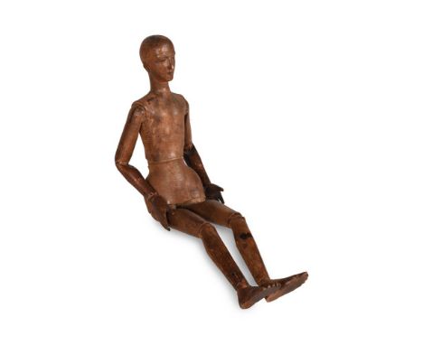 A CARVED ARTIST'S LAY FIGURE OR MANNEQUIN ITALIAN OR FRENCH, 19TH CENTURYOf articulated form 58cm highCondition Report: Colou