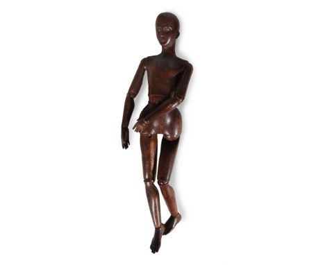 A CARVED ARTIST'S LAY FIGURE OR MANNEQUIN ITALIAN OR FRENCH, 19TH CENTURYOf articulated form 97cm highCondition Report: Colou