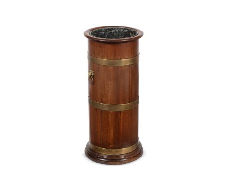 A MAHOGANY AND BRASS BOUND STICK STAND IN REGENCY STYLE, LATE 19TH CENTURY 65cm high, the base 31cm diameter  Condition Repor