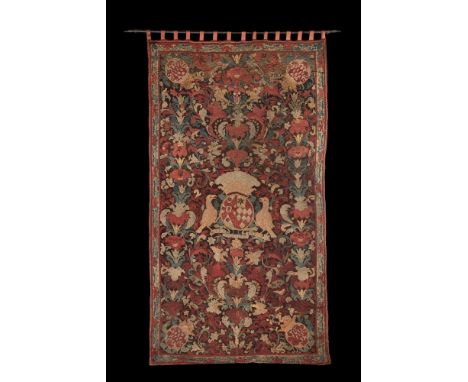 A RARE ENGLISH NEEDLEWORK ARMORIAL TAPESTRY CIRCA 1697-1709 Decorated to the centre with armorial for Sir Nathaniel Napier (1