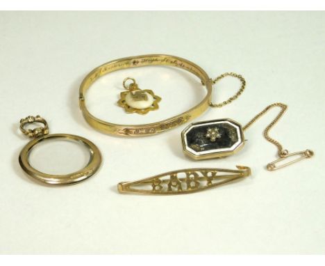 GOLD PINS ETC. A 9ct. gold 'Baby' brooch &amp; a child's yellow metal bangle for Thelma. Also, a 9ct. gold photograph locket,