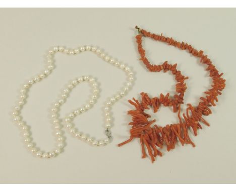 CORAL & PEARL. A necklace of coral stick & chip beads & a modern cultured pearl necklace, length 58cm.