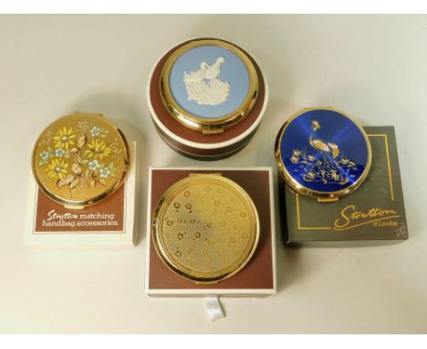 COMPACTS. Four Stratton vintage powder compacts, each boxed.