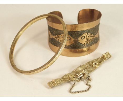 BANGLES ETC. A gold plated slave bangle, a hand made copper bangle by Moda, Malta & a gold plated stone set bracelet.