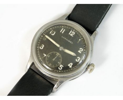 LONGINES. A rare gentleman's German military Longines wristwatch c.1942. The black dial with luminous Arabic numerals, subsid