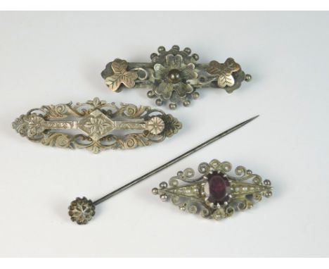 PINS ETC. Two late Victorian/early Edwardian silver bar brooches, one other brooch &amp; a stick pin.