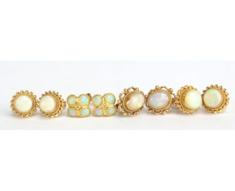 Four pairs of 9ct yellow gold opal set earrings (4).