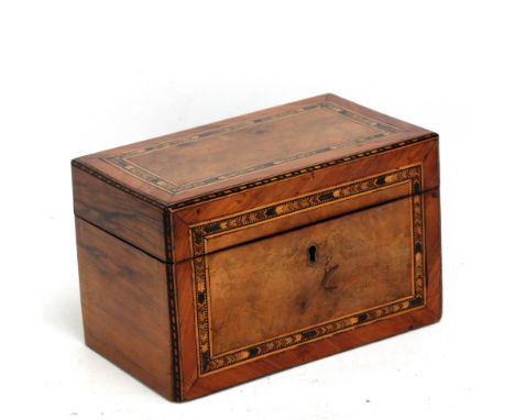 A Victorian walnut and inlaid two division tea caddy, width 20.5cm.Additional InformationHinges slightly loose, veneers lifti