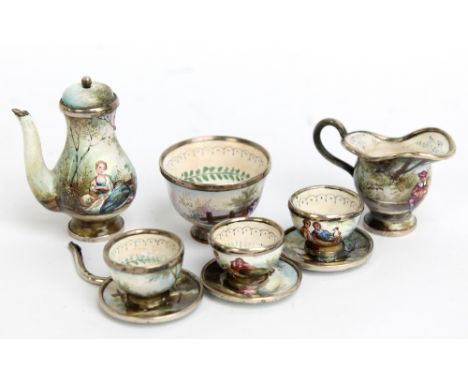 A Vienna enamel miniature white metal mounted coffee service, comprising coffee pot, bowl, jug and three cups and saucers.Add