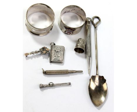 A mixed group of silver to include a George V stamp holder, Birmingham 1915, three propelling pencils, also a cased silver th