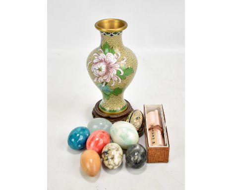 A group of ornamental resin eggs and two wooden examples, a 20th century Chinese cloisonné vase with wooden stand and a scrol