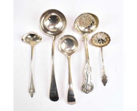 An Edwardian hallmarked silver King's pattern sugar sifting spoon, London 1907, length 15.5cm, a further sugar sifting spoon,
