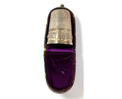 GEORGE UNITE; a novelty cased tot measure in the form of a thimble inscribed "Just a Thimble Full", Birmingham 1877, height 6