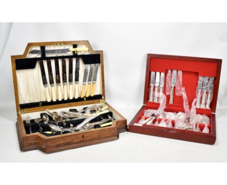 A cased canteen of silver plated King's pattern cutlery and an oak canteen containing a quantity of associated plated flatwar