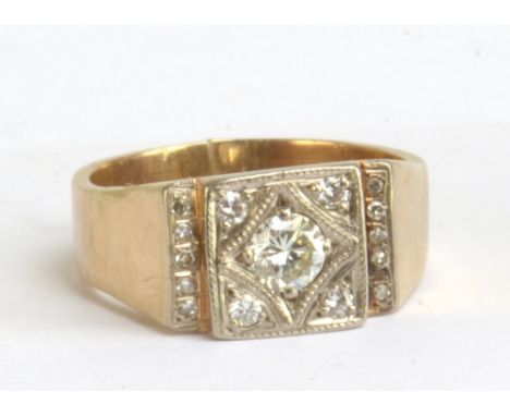 A gentleman's yellow metal diamond set signet ring, marked 9ct and 18ct,&nbsp;the central stone weighing approx 0.25ct, ring 