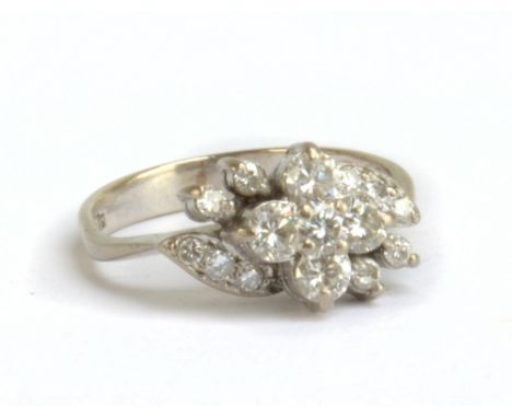 An 18ct white gold diamond-set floral ring, size K, approx 3.4g.