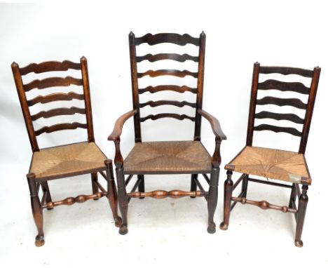 A harlequin set of late 19th century ladder-back rush-seated dining chairs (6 + 2 carvers).