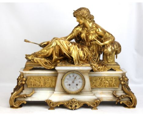 A monumental late nineteenth century French alabaster and ormolu mounted mantel clock with seated figure of Diana the Huntres