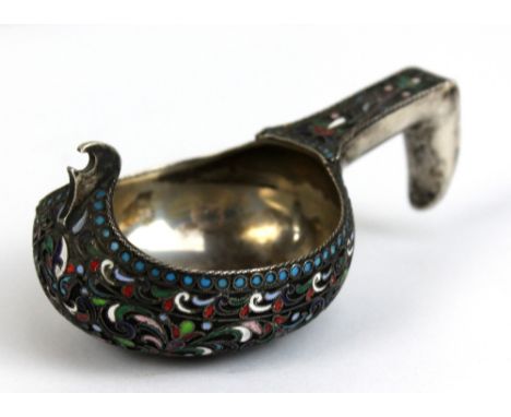 A Russian silver and enamel kovsh of typical form, length 8.7cm, approx 2.02oz.Additional InformationTarnish throughout, bowl