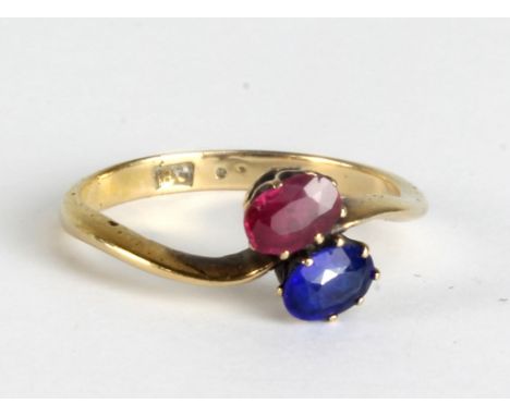 An 18ct yellow gold two stone dress ring, size N, approx 2.4g.