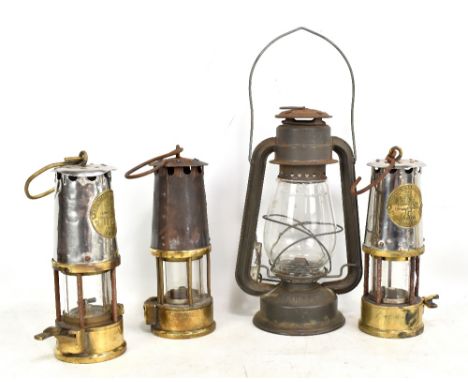 Three Protector Lamp &amp; Lighting Co Ltd Eccles miners' safety lamps, two type SL and one type GR6S, height of each excludi