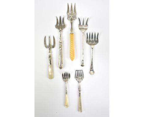 A George V hallmarked silver small bread fork, Birmingham 1910, five further small bread forks and a sardine fork (7).