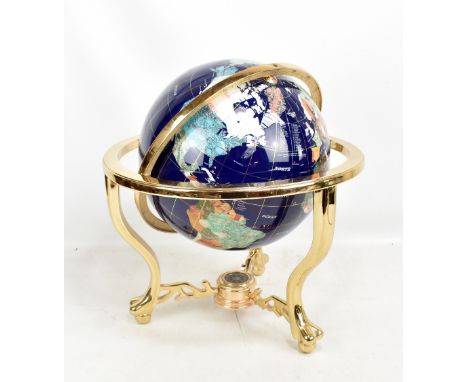 A large specimen globe within gimballed frame.