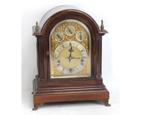 WINTERHALDER &amp; HOFMEIER; a circular 1900 mahogany mantel clock, with repeating twin fusee movement, silvered chapter ring