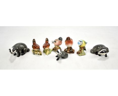 BESWICK; five birds including '980 Robin', '991 Chaffinch' etc and three badges (8).Additional InformationThe wren with very 