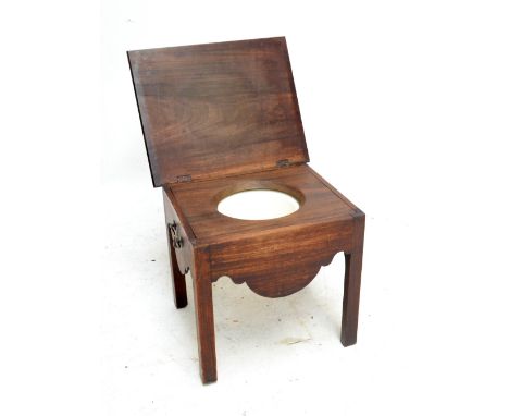 A 19th century mahogany commode with contents, width 53cm.