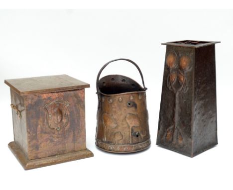 An Arts and Crafts beaten copper stick stand of taper and rectangular form, Arts and Crafts coal bucket and a square section 