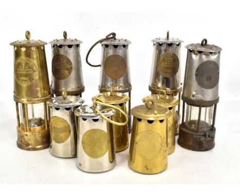 Four Protector Lamp &amp; Lighting Co Ltd Eccles miners' safety lamps, three type 6 and one type GR6S, a further heavily worn