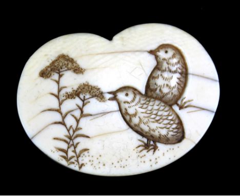 A 19th century Japanese carved ivory netsuke of a manju and carved with two quail beside branches, length 3.8cm.Additional In