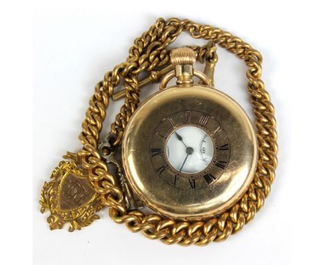 A gold-plated crown-wind half hunter pocket watch, the enamel dial set with Roman numerals and subsidiary dials and a graduat