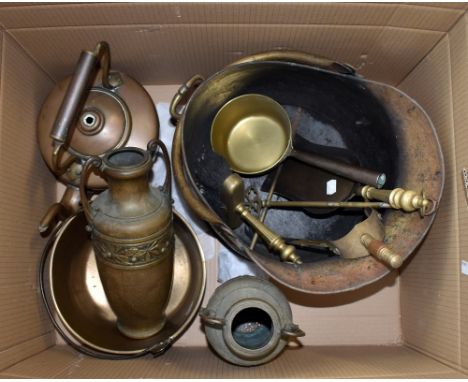 A mixed group of copper and brass to include a coal bucket, fire tools, and two twin handled vase, etc&nbsp;&nbsp;